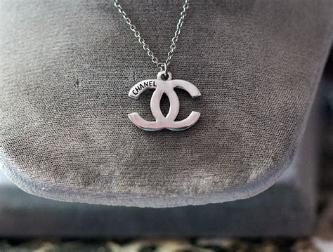 chanel logo necklace fake|chanel necklace knockoffs.